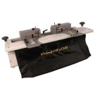 Akiles Crimp@Coil Heavy Duty Automatic Coil Crimper machine with dual crimping heads and a black catch bag, used for efficiently crimping coil binding spines.