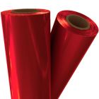 Two rolls of vibrant Red Pigment Laminating / Toner Fusing Foil with a glossy finish, perfect for adding a metallic red touch to printed materials.