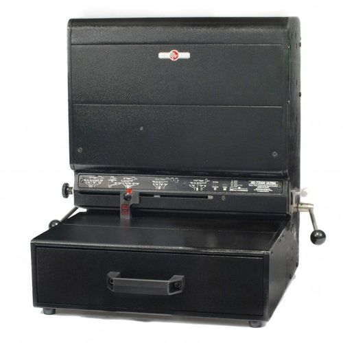 The Rhin-O-Tuff Onyx HD7725H 14" Open-Ended Horizontal Electric Punch, a heavy-duty, black electric punching machine designed for high-volume document processing.