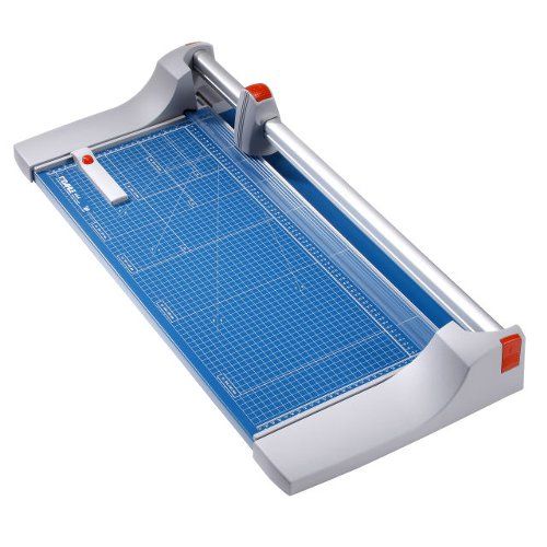 Dahle Model 444 Premium Rolling Trimmer - 26 3/8 Inch, featuring a blue cutting mat with measurement grid and a durable rolling blade for precise paper trimming.