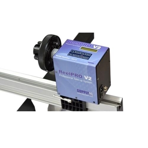 ReelPRO V2 Universal Professional Take-Up System mounted on a machine for efficient media handling.