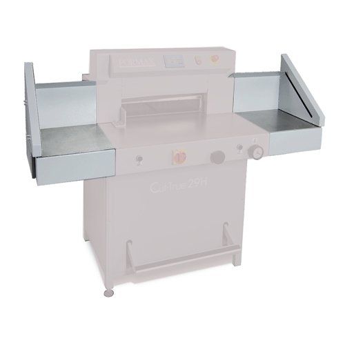 Side Tables for Formax Cut-True 29A and 29H Cutters are shown attached on both sides of a cutting machine, featuring flat metallic surfaces with angled supports for additional workspace.