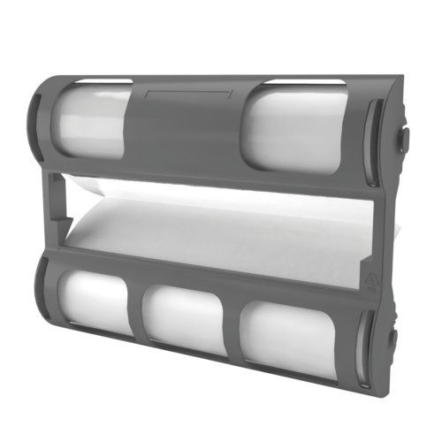 A gray Xyron 1255 Laminator Cartridges holder with two empty cartridge slots and a roll of laminating film partially visible.
