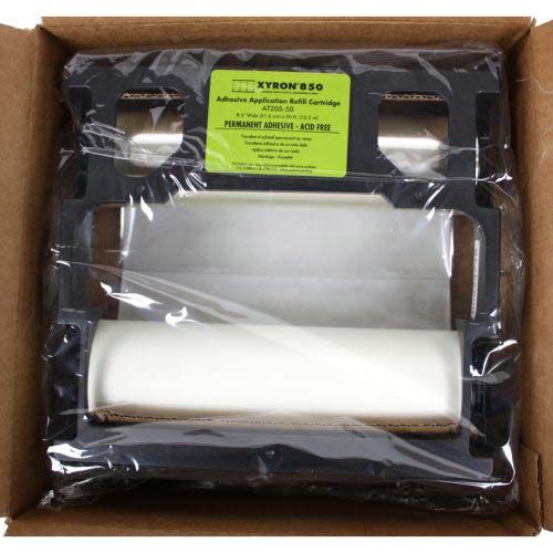 A boxed Xyron 850 Acid-Free Permanent Adhesive Cartridge 50', showing the refill cartridge inside its packaging.
