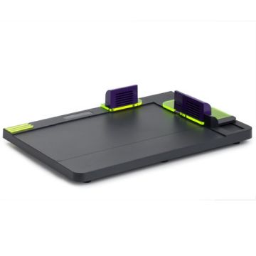 A Fastback Hardcover Guide device, featuring a sleek black platform with purple and neon green elements used for aligning and binding hardcover books.