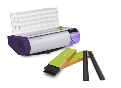 Fastback 9 tape binding machine and two boxes of Fastback black super strips.