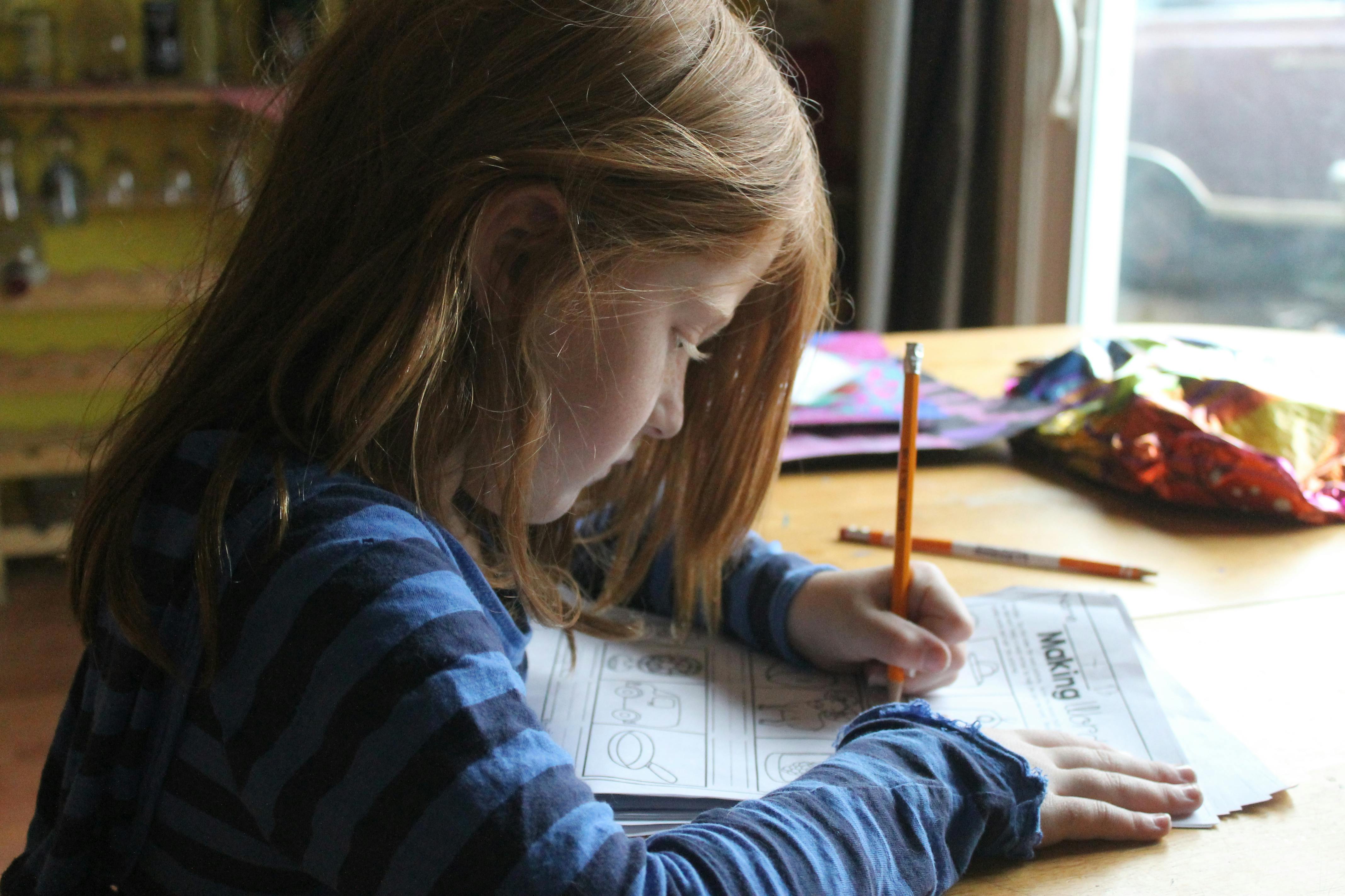 young girl doing homework