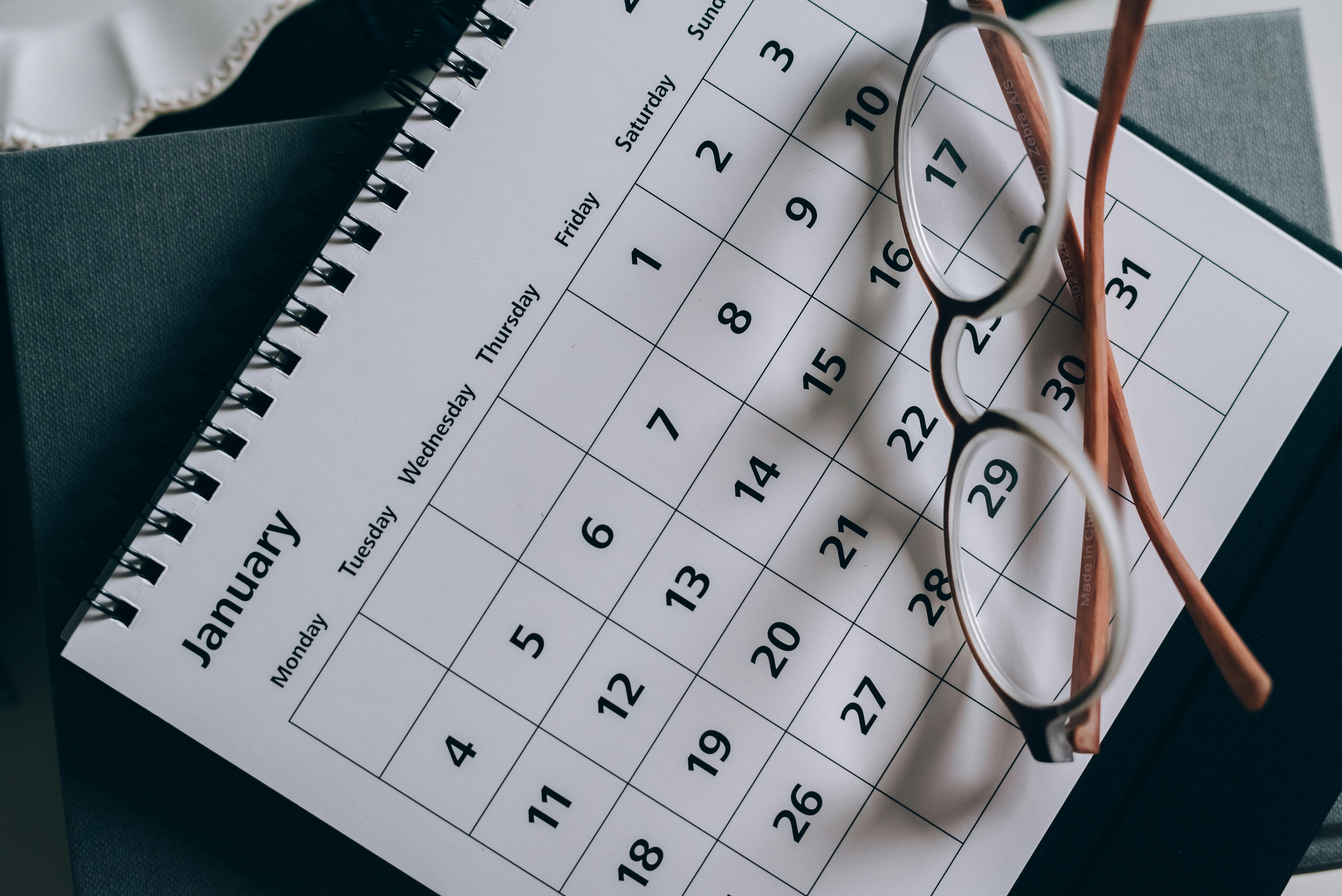 Custom calendar on table with glasses