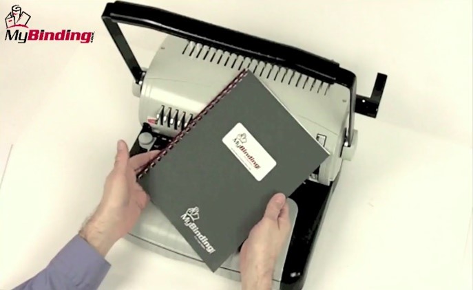 Finished comb bound book with a comb binding machine